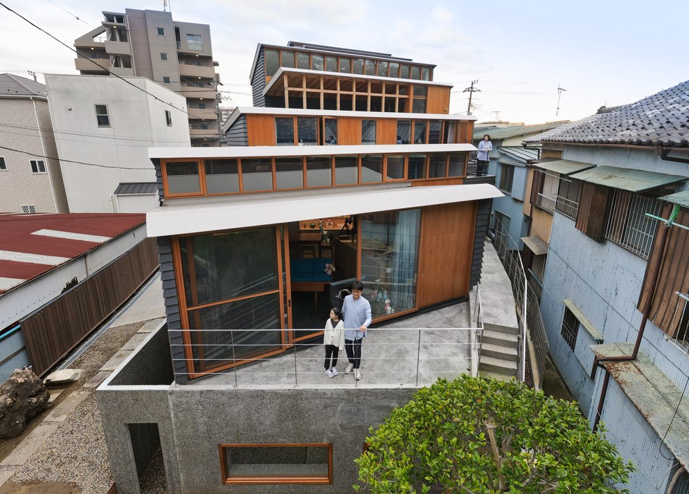 Seven Stacked Block Houses and Galleries by KOMPAS Studio