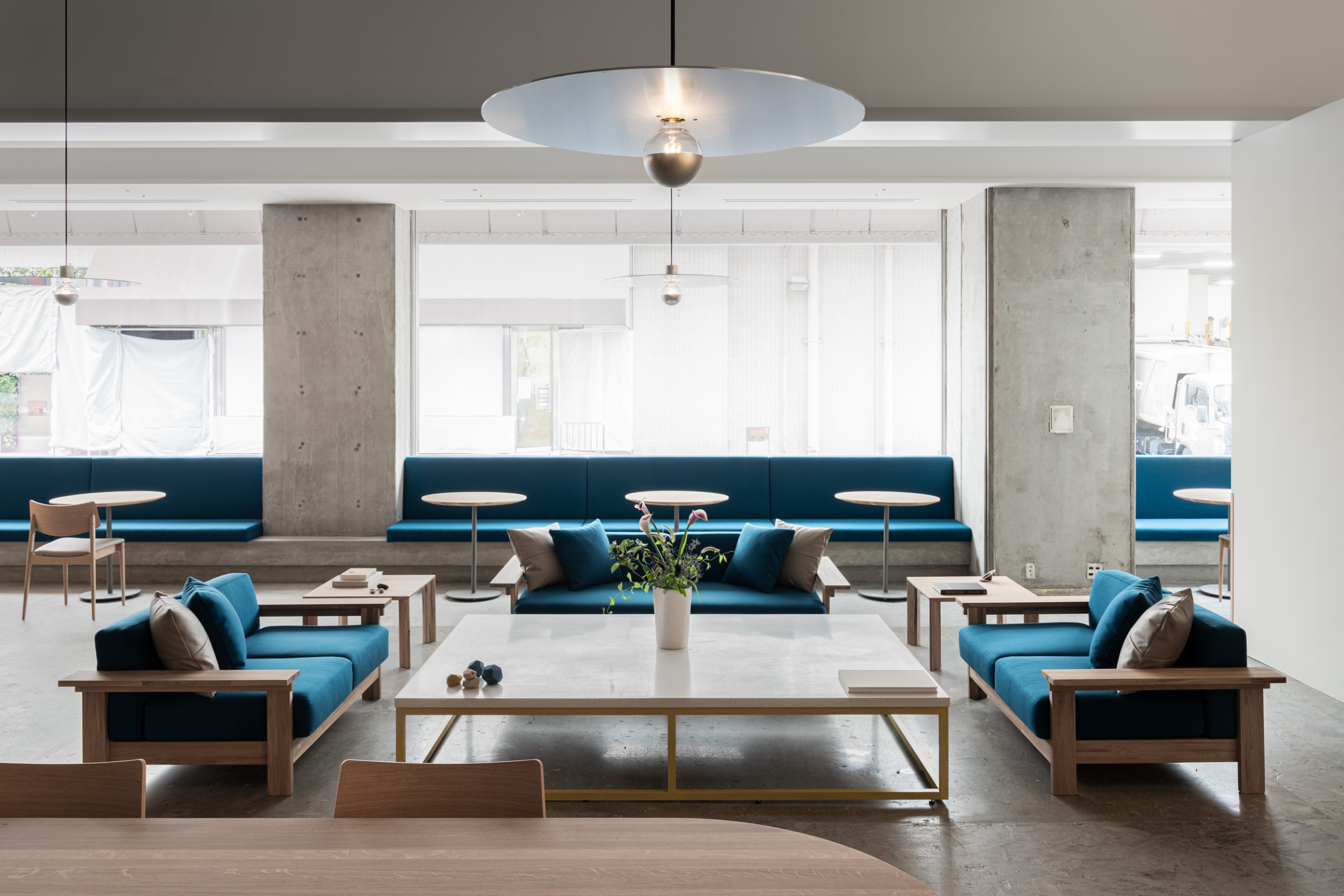 A Blue Glow Enhances the Blue Bottle Coffee's Charm