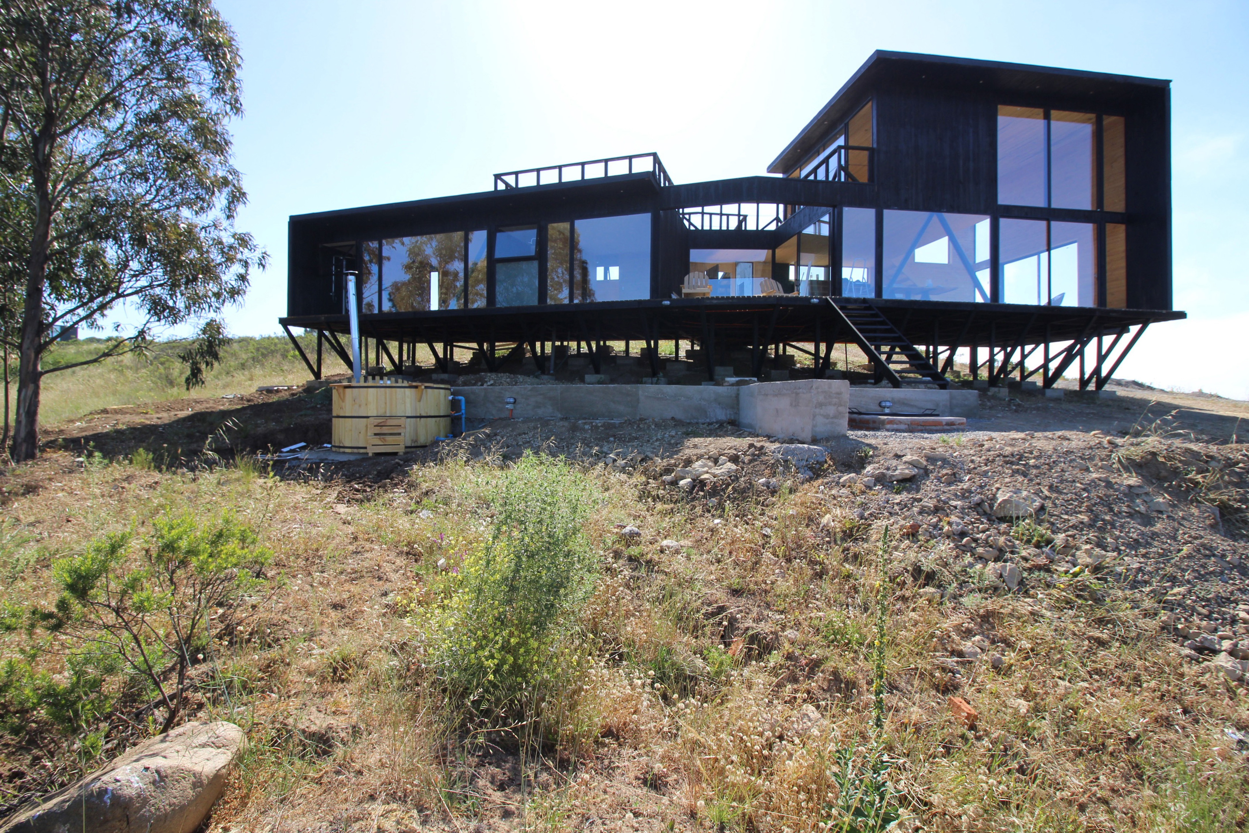 The Charming Black House by Nicolas CRUZ Arquitectos