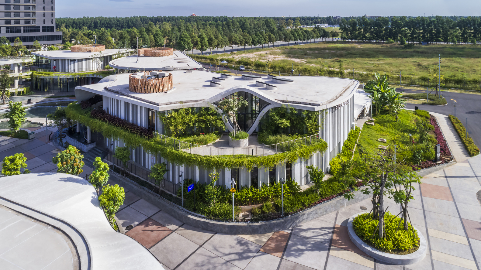 Unique Dining and Eco-Education in Pizza 4P's Eco-cycle Pavilion