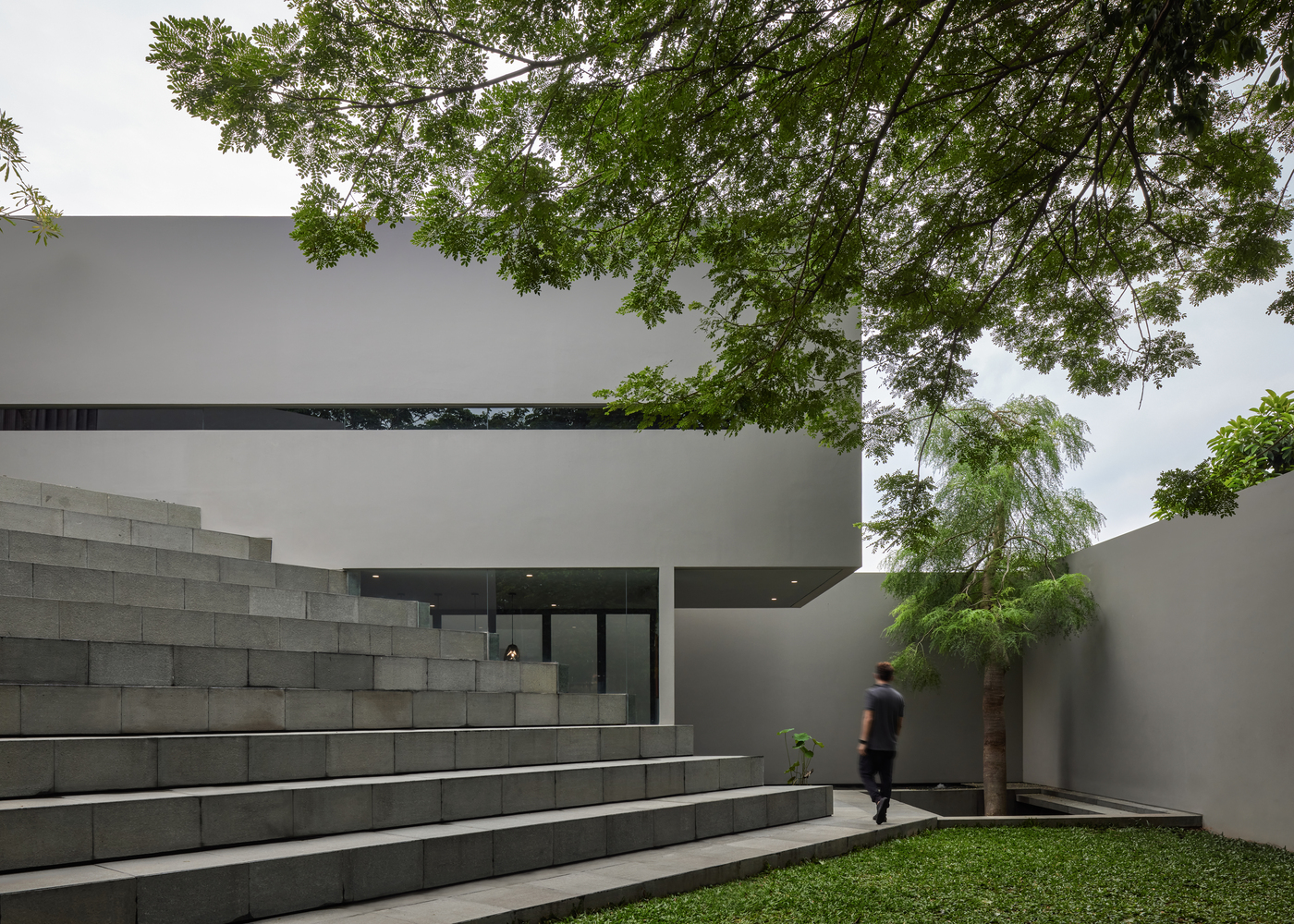 Residence 57: Modern Minimalist Haven with Amphitheater Stairs