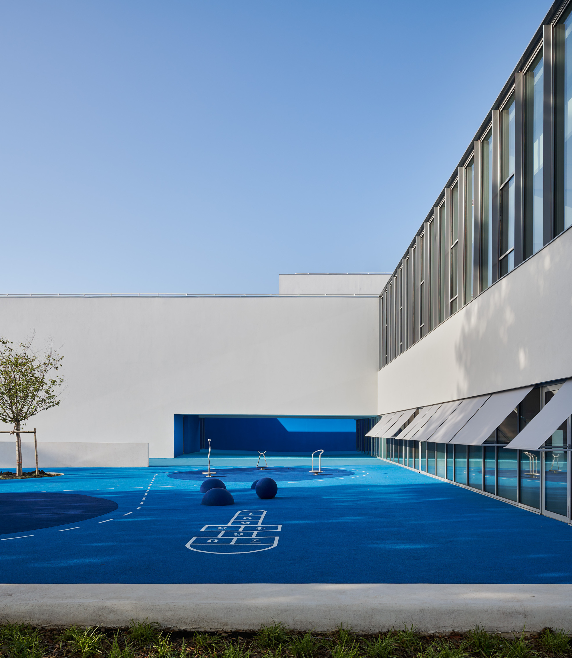 ​​A Multifunctional Building Covered in Blue Palette
