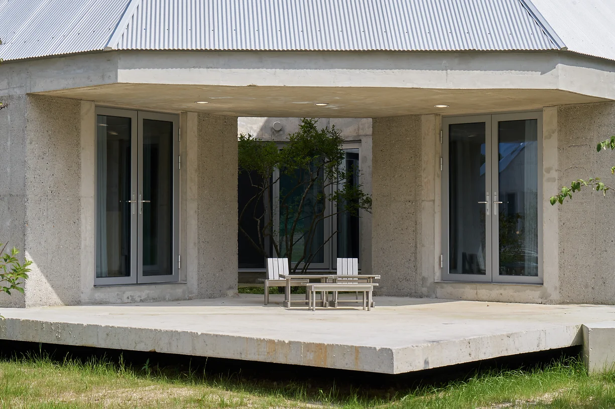 AOA Architects Completes 'Concrete' HOJI Houses