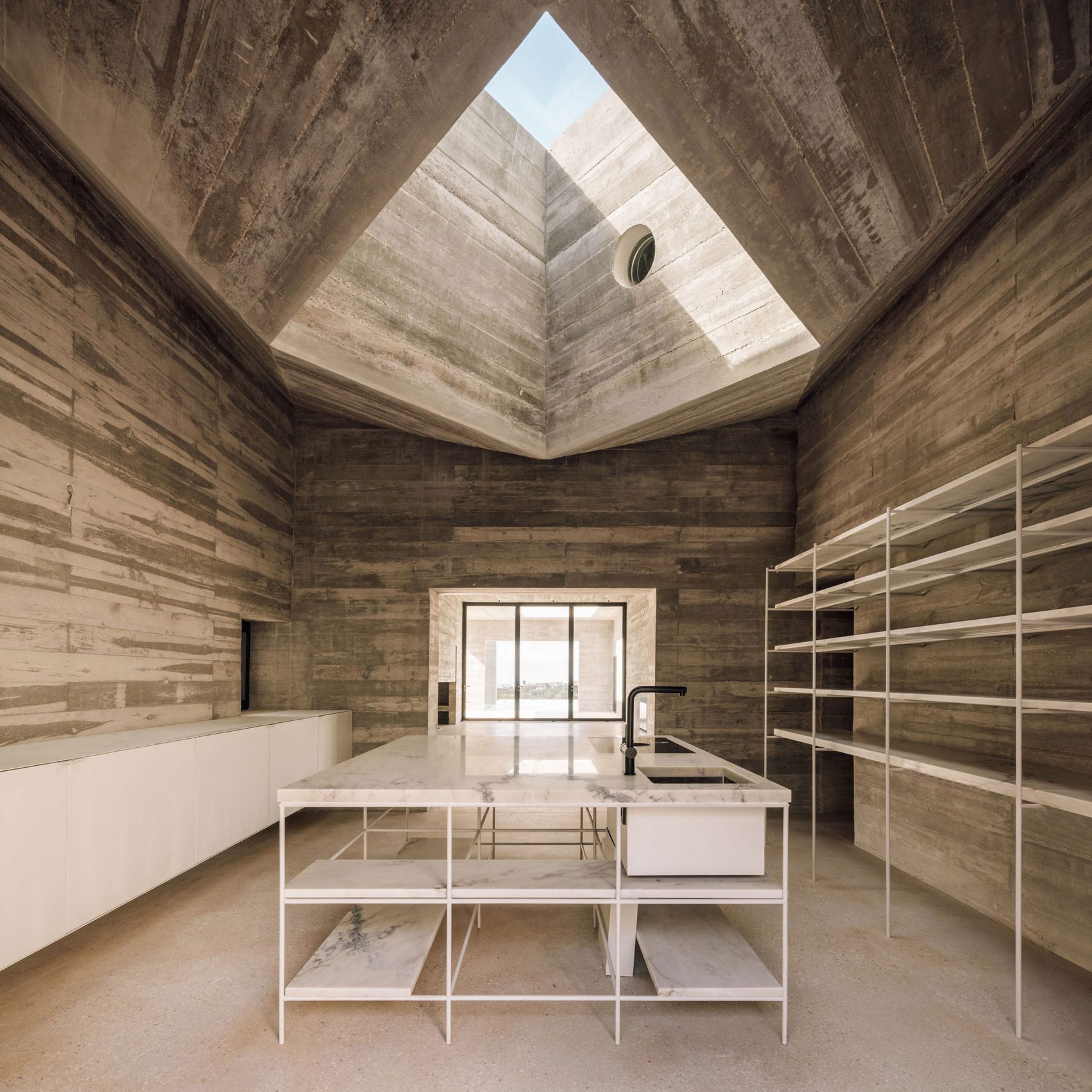 Architect's Brutalist Style House on The Hill designed by Pedro Domingos Arquitectos