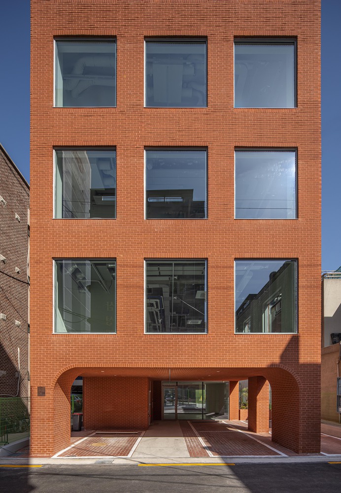 The facade is dominated by a single material