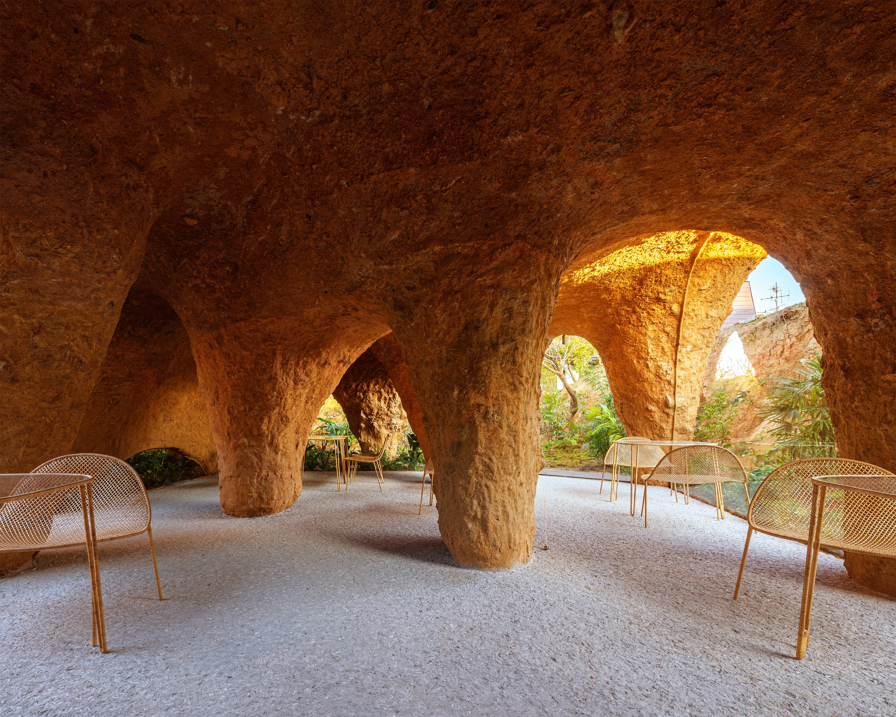 The volume of the building implies an organic shape like a cave maze