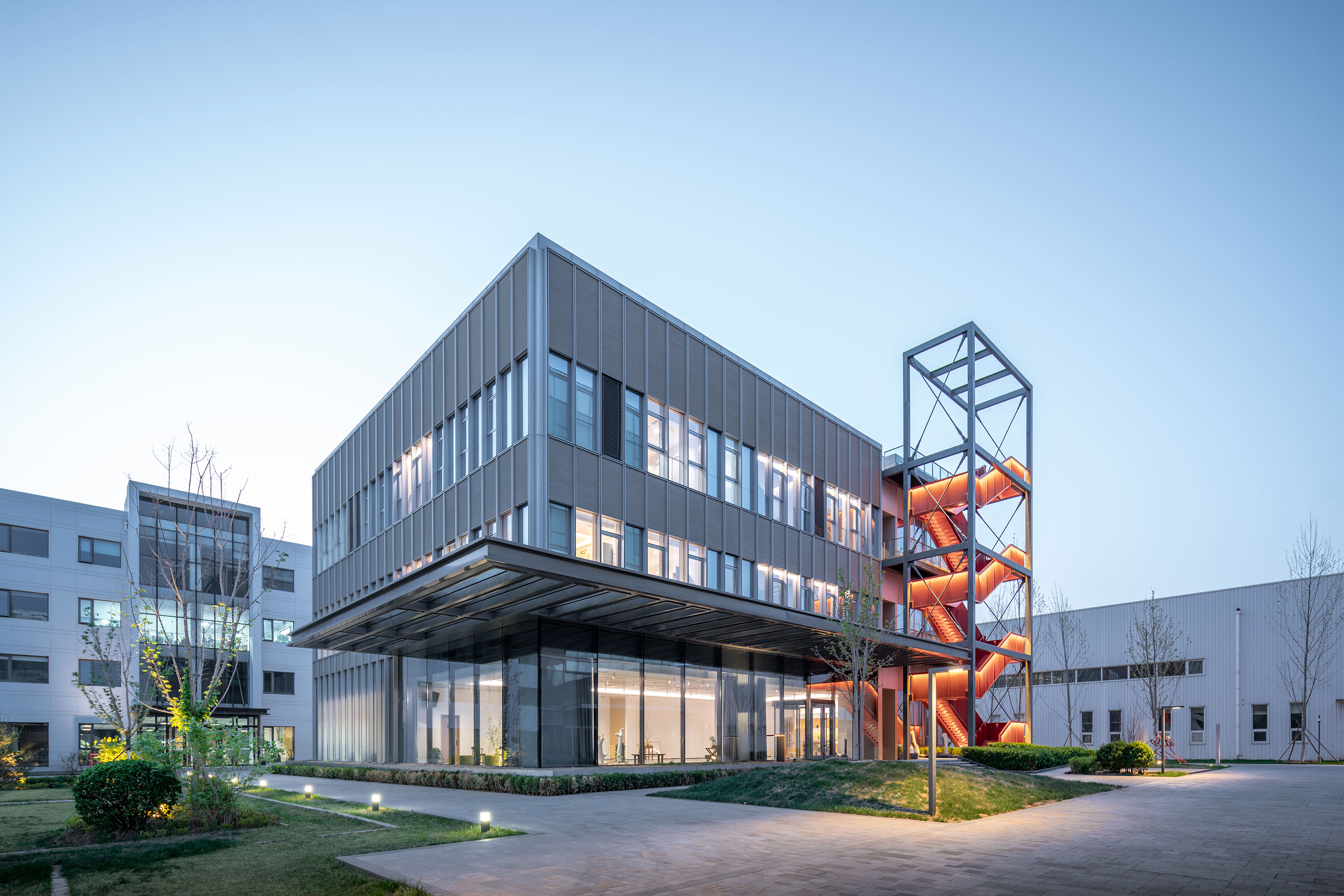 There is also a canopy connected to the exterior staircase on the other side, which are part of the 'plug-in' concept