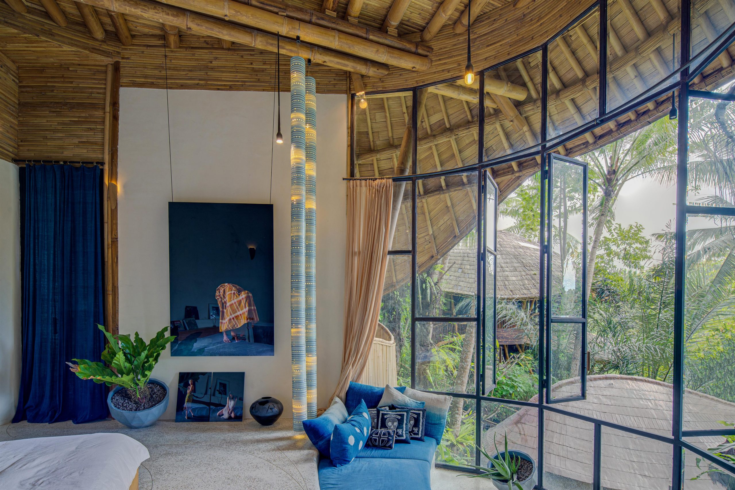 The interior of the bedroom in the Echo Main House features a combination of several materials