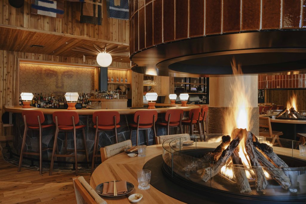 Bar Table Equipped with Several Stools