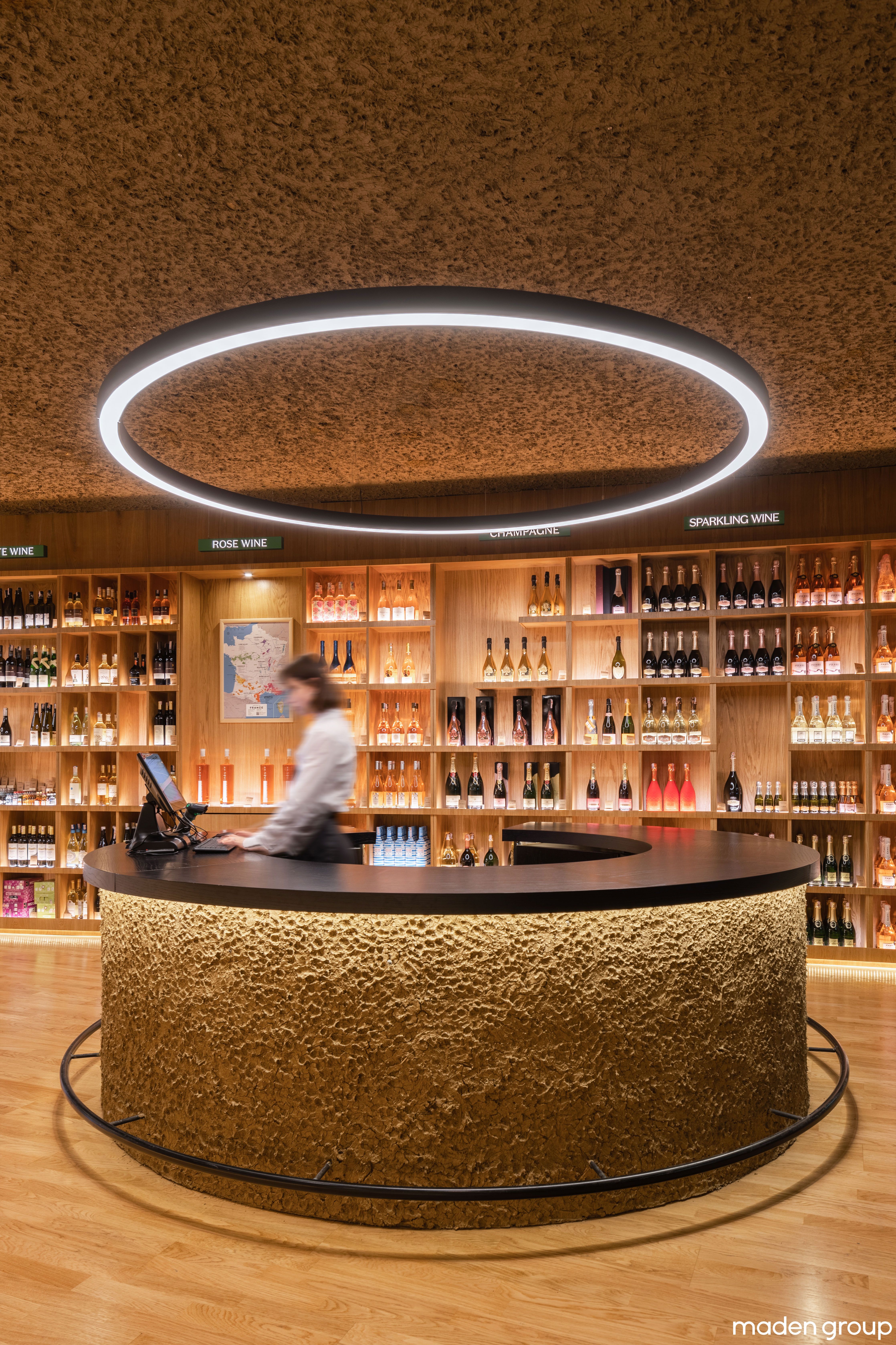 A circular mini bar welcomes visitors in the front area