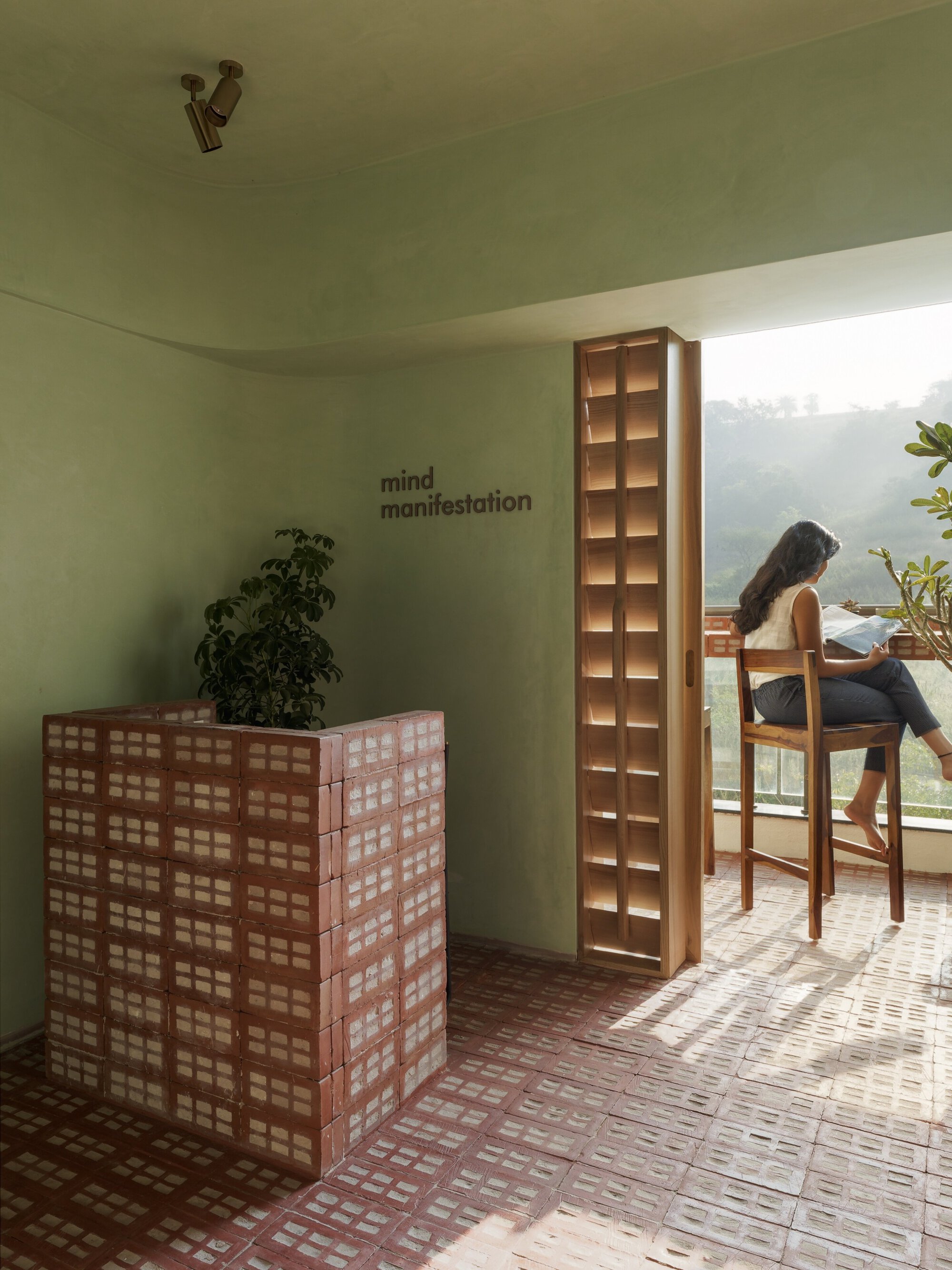 The Perforated Red Bricks Dominate Studio Mind Manifestation Design