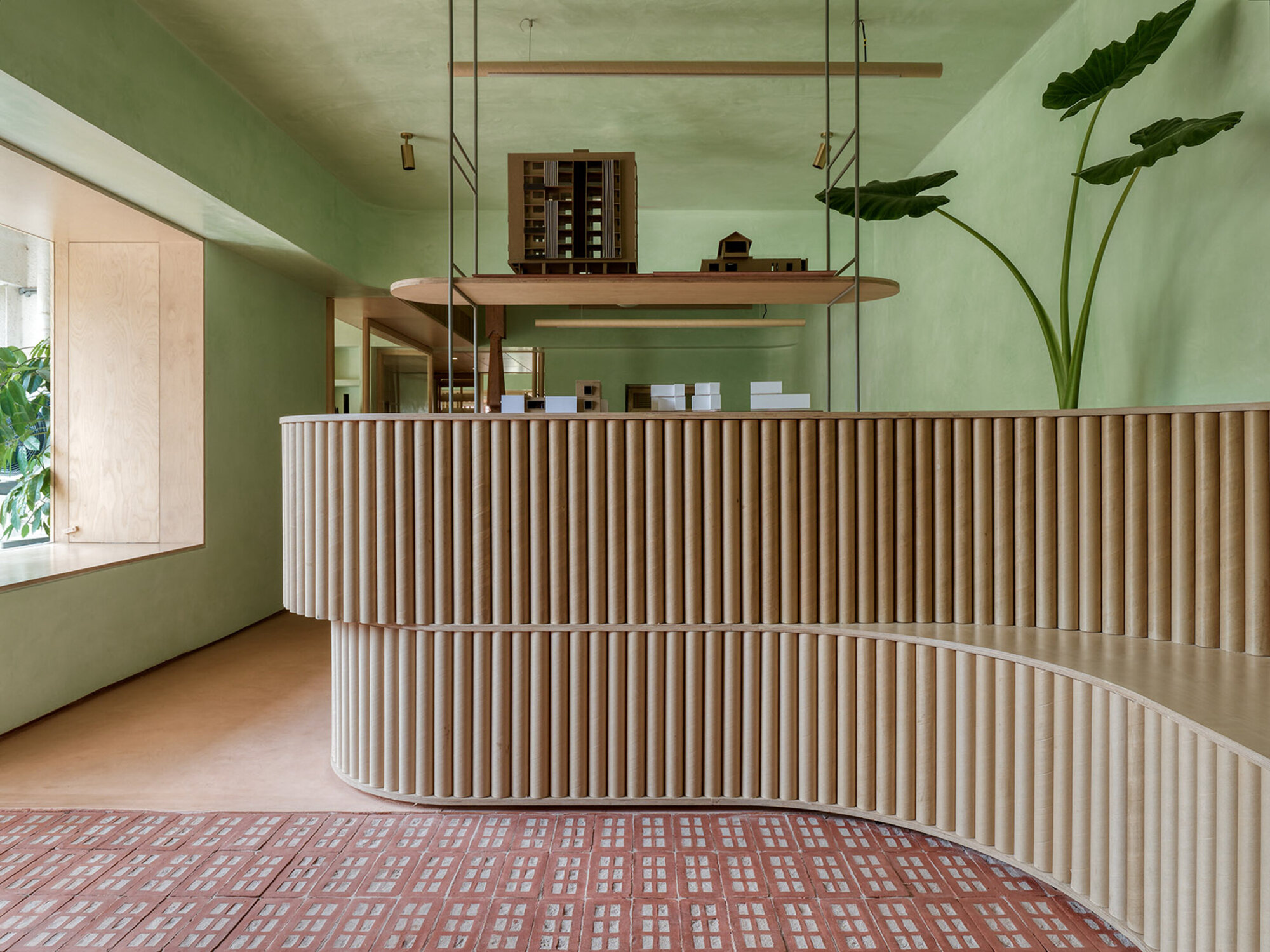 The Perforated Red Bricks Dominate Studio Mind Manifestation Design