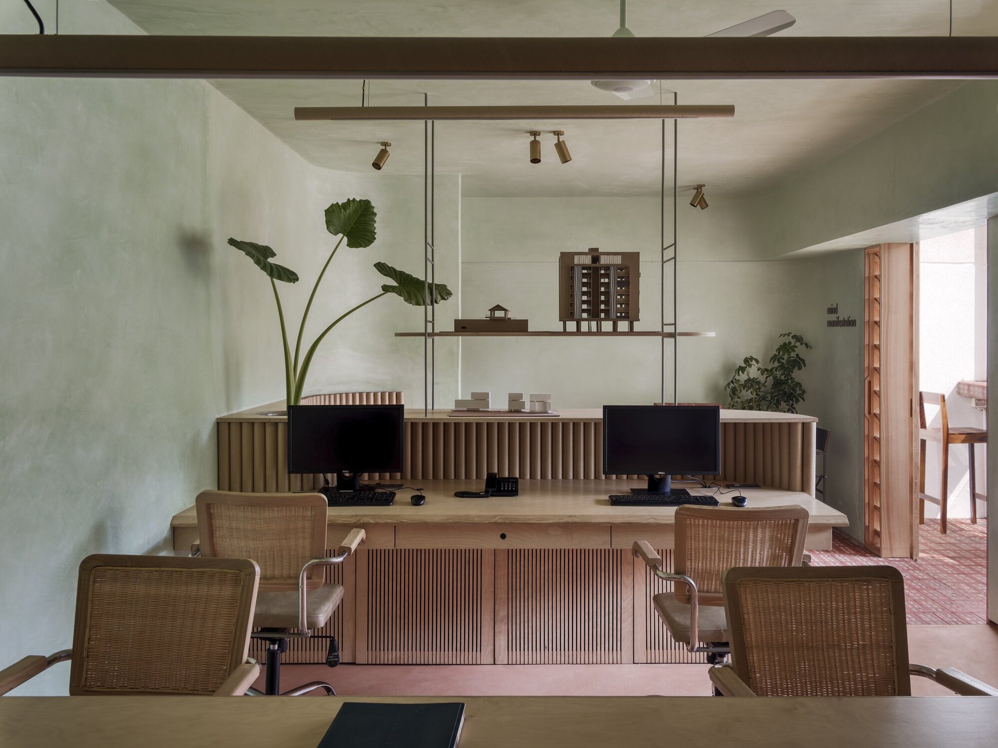 The Perforated Red Bricks Dominate Studio Mind Manifestation Design