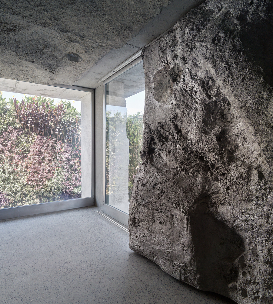 the interior wall covering of the building which also uses a unique concrete texture