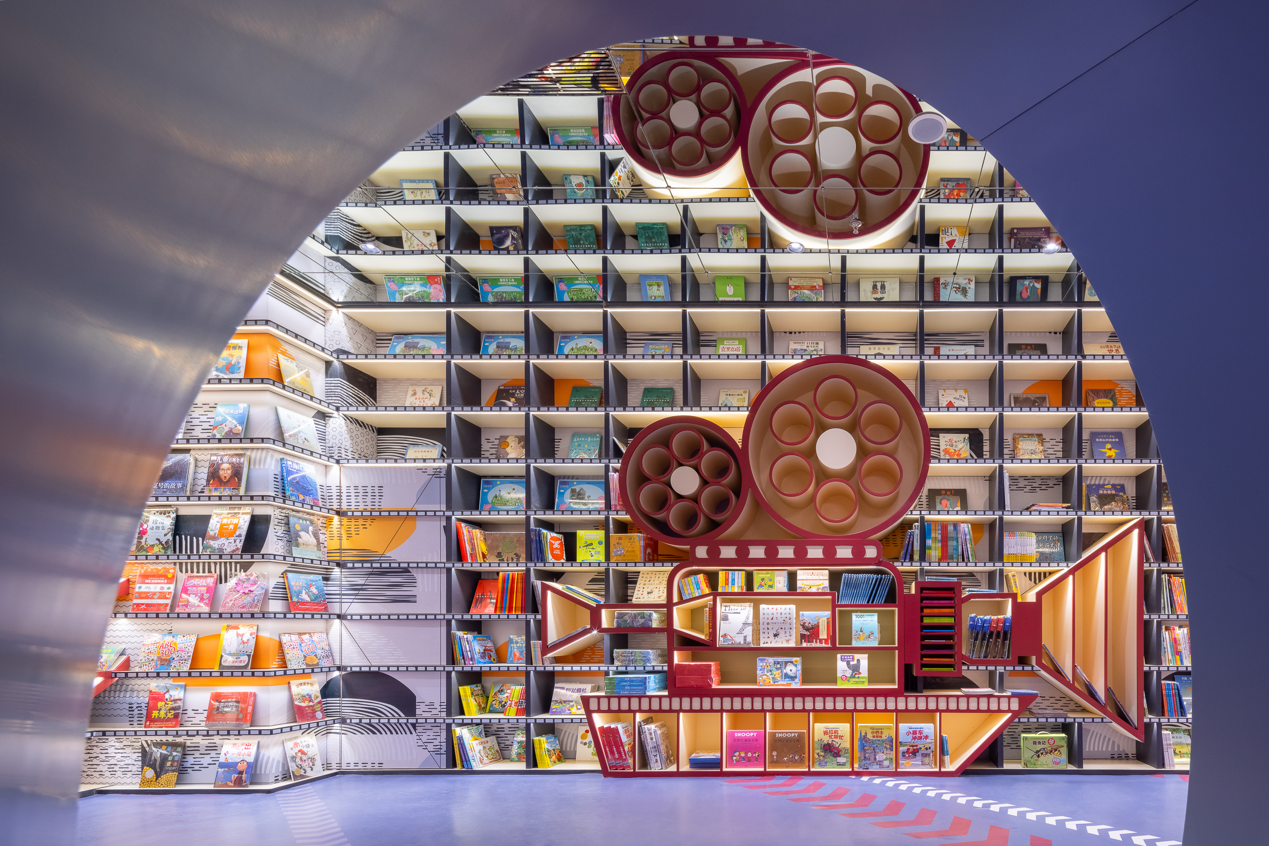 The design of the children's bookstore area forms a video record film