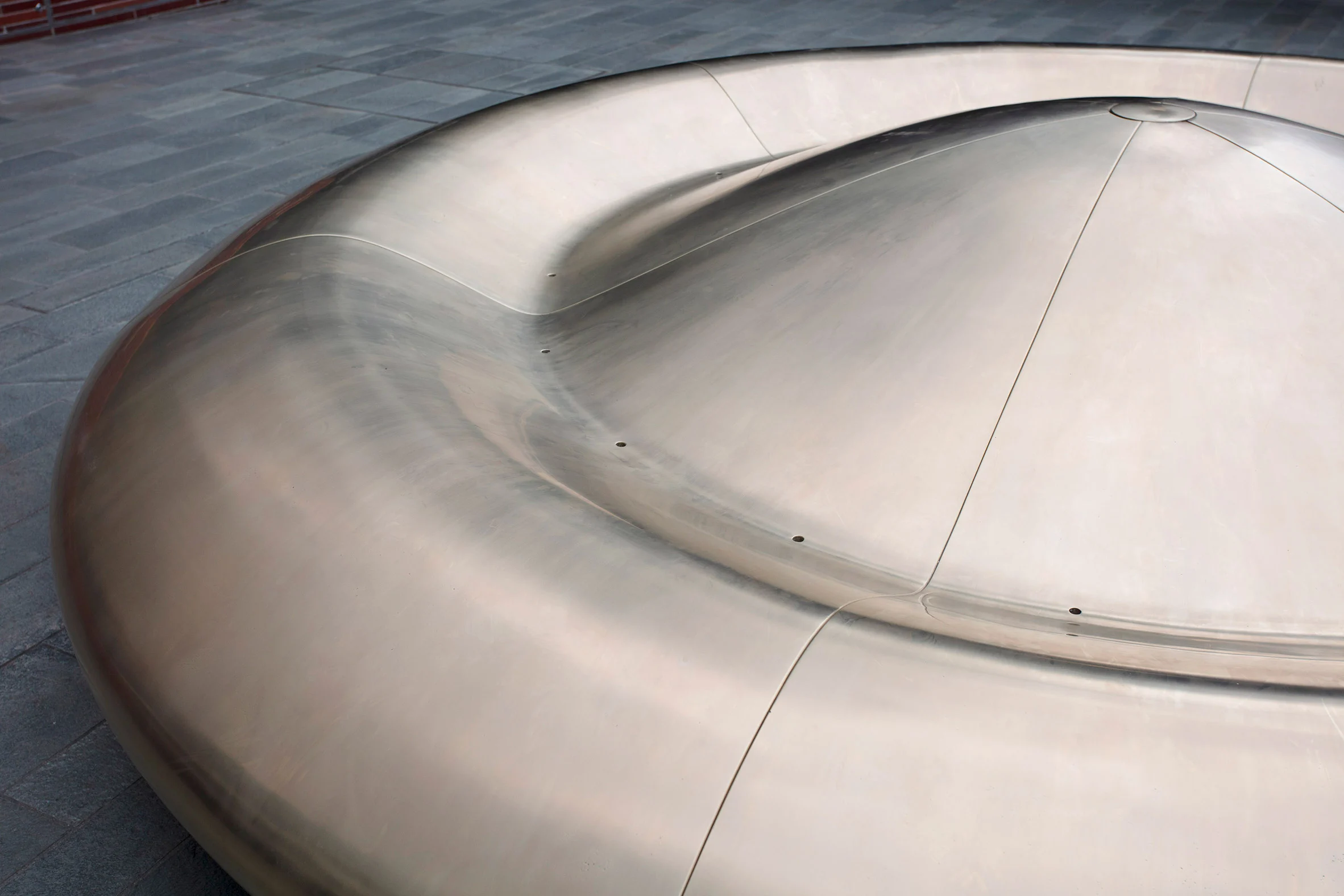 This UFO-like chair is made of aluminum