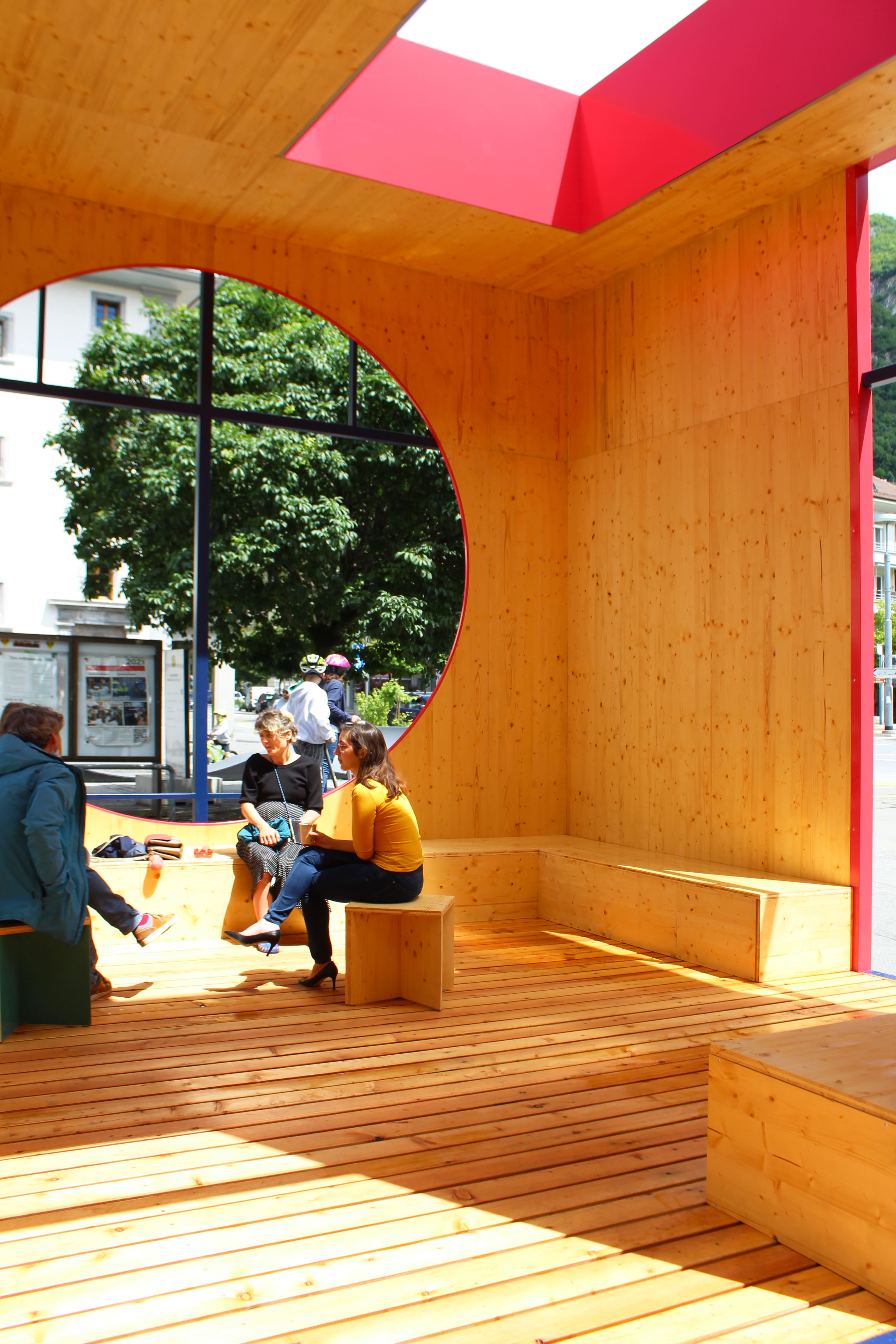 The largest pavilion functions as a community meeting place