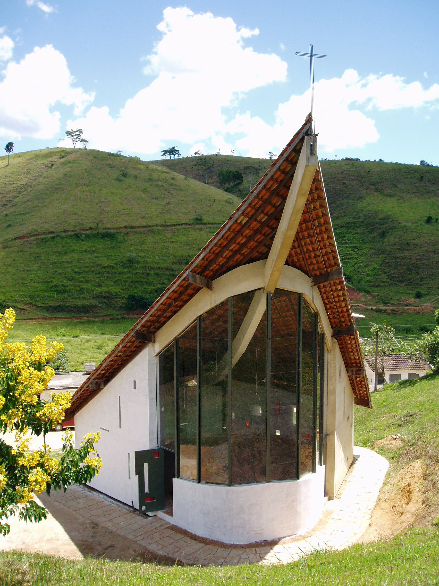 The glass panels in the background of the altar of Santa Filomena Chapel