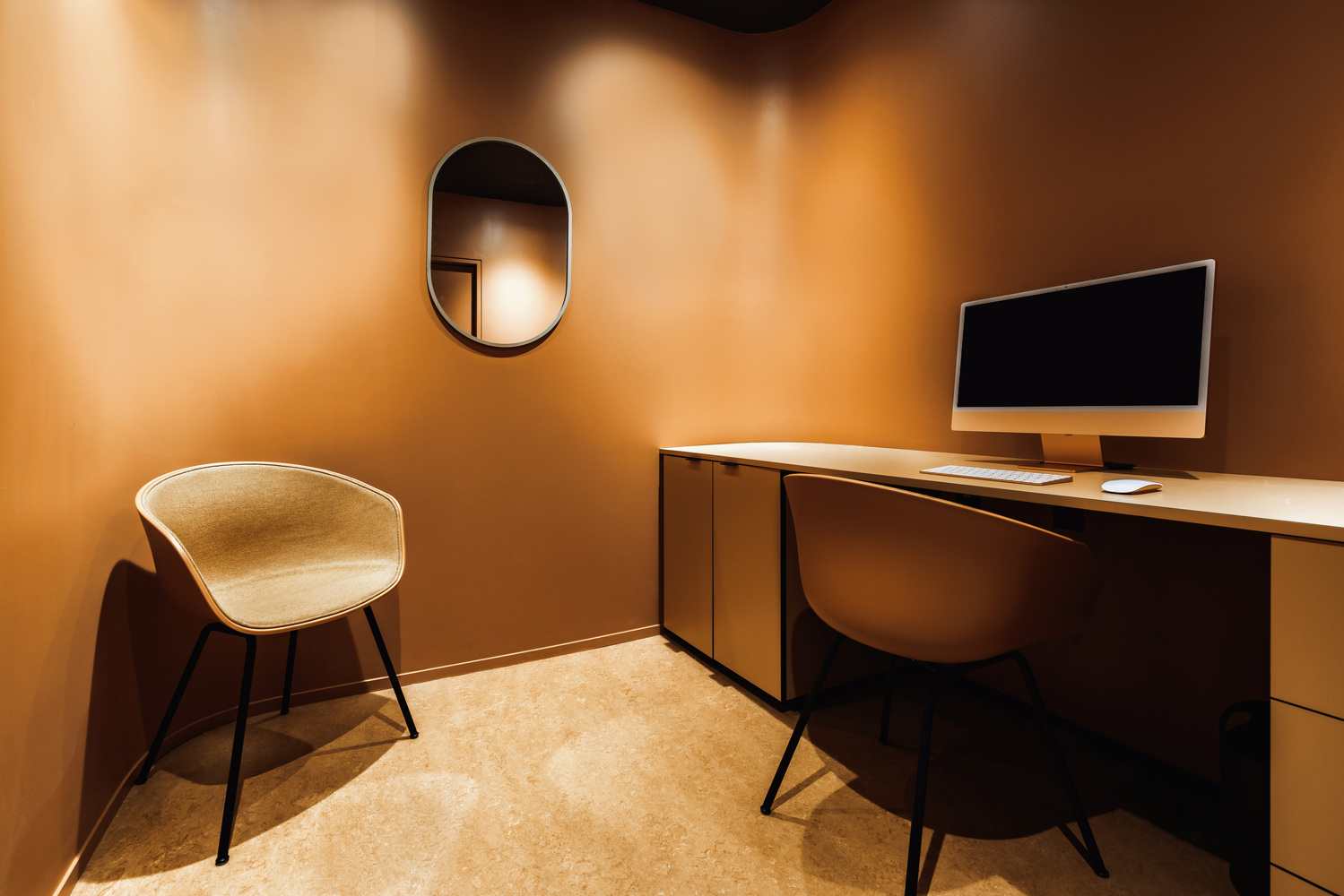 Beauty Edit Clinic office space with an orange color palette