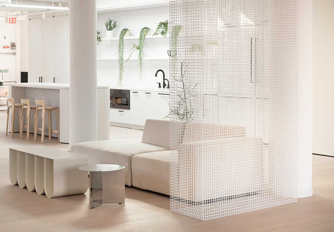 Pantry area with white nuances with tables and stools