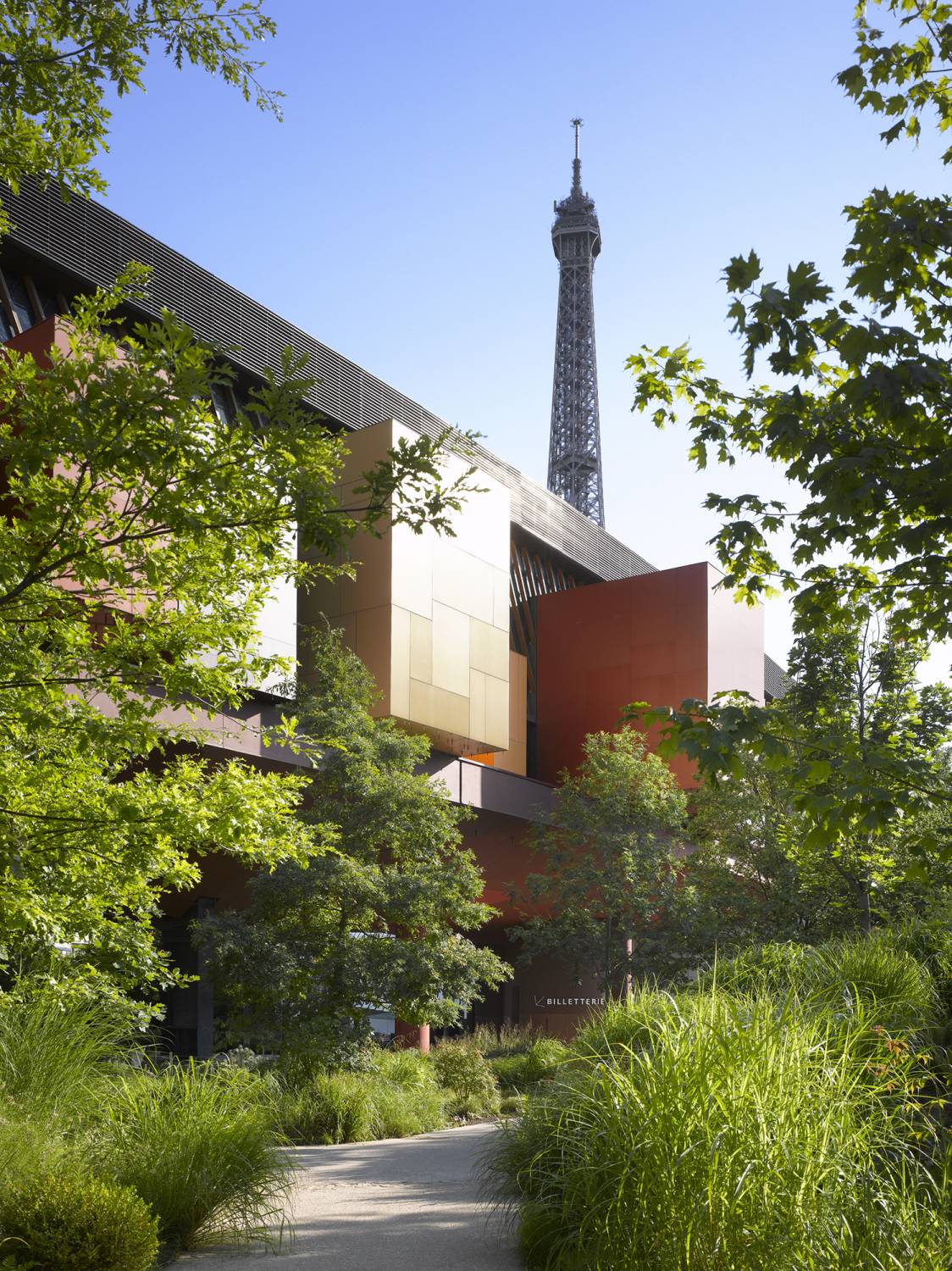 Dense vegetation in the front yard of the MusÃ©e du Quai Branly