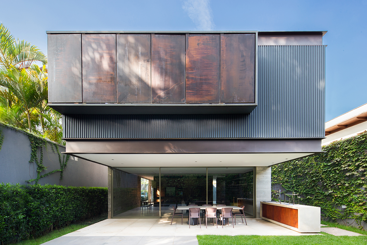 A view of the back of the Bento House when the top floor facade is closed