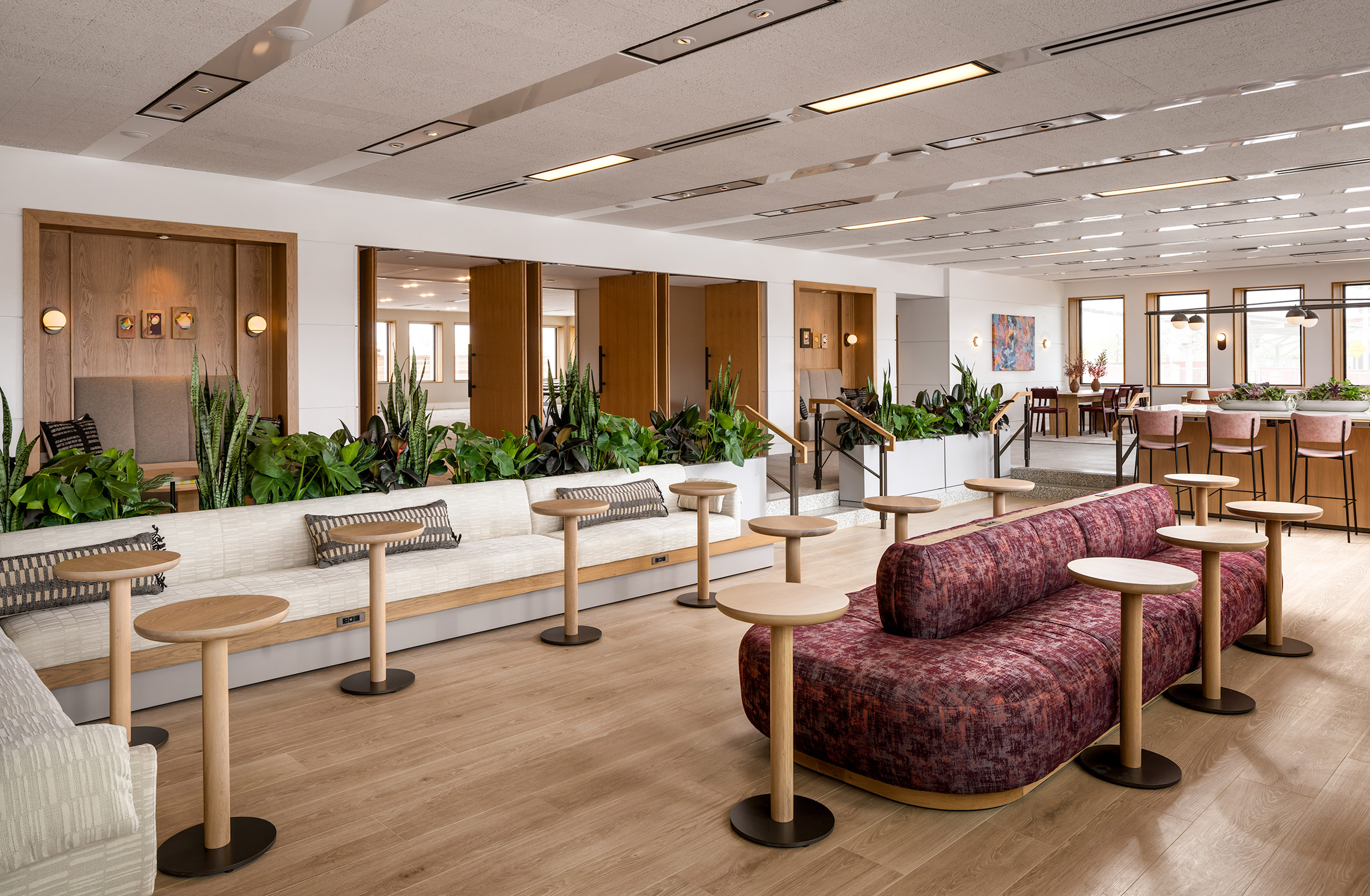 The interior of one of the rooms in Hotel Marcel is dominated by a natural touch of wood and white on the walls