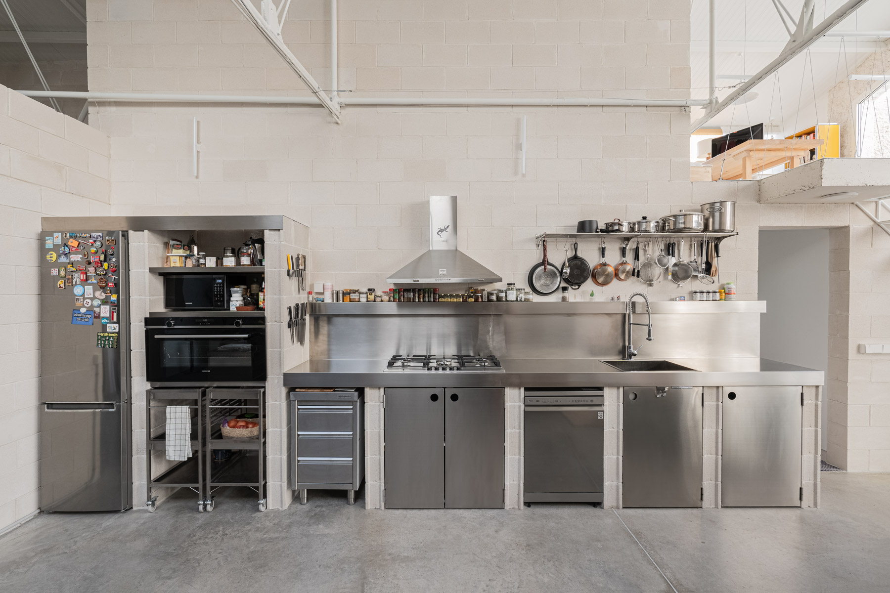 The kitchen at BlasÃ³n is stainless steel