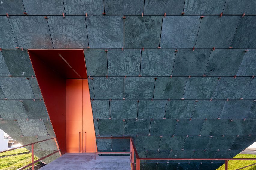 The facade of the Chapel of Eternal Light with green Guatemalan marble as the material