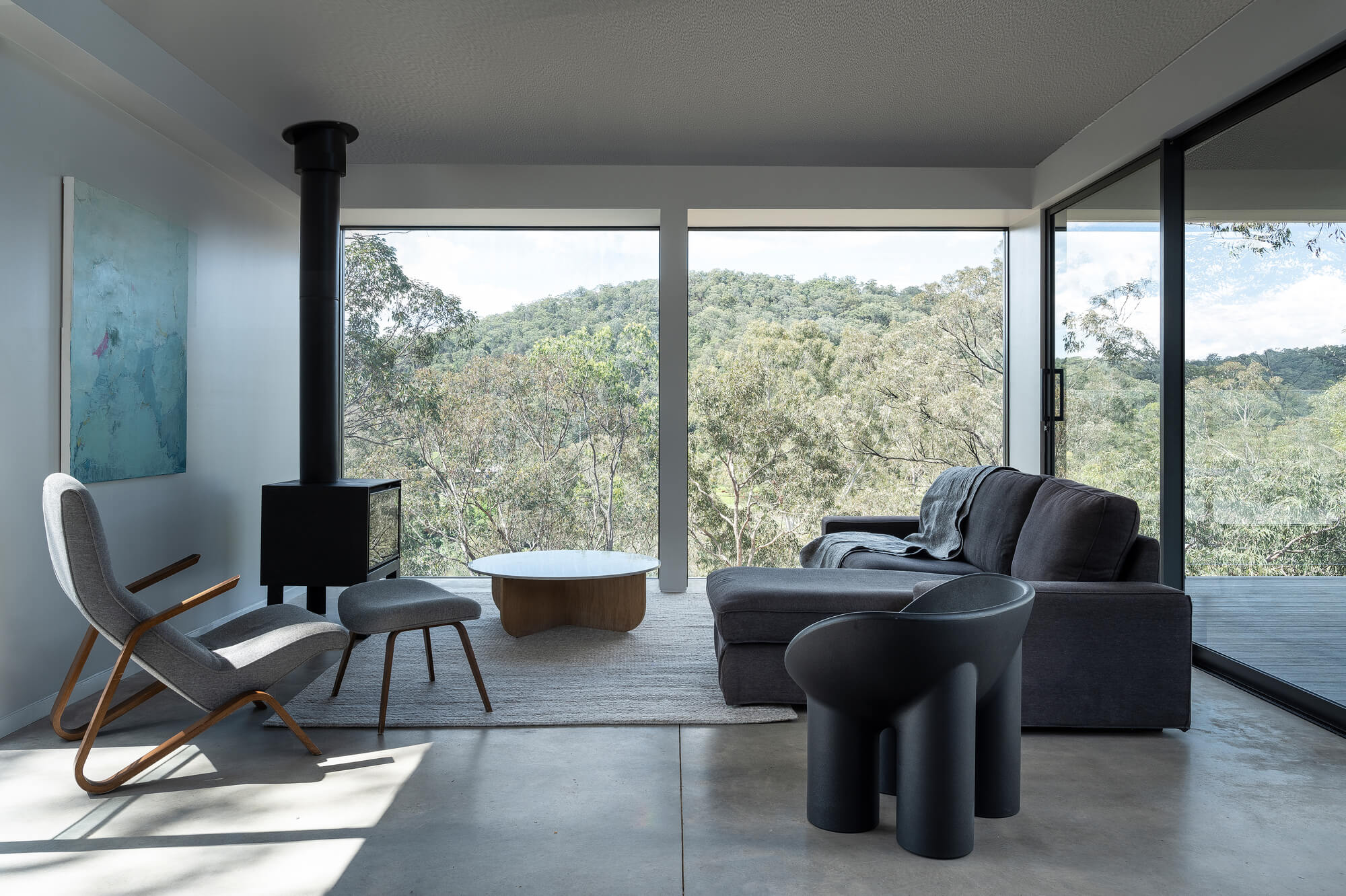 Living room of the Colo Crossings House with panoramic landscape