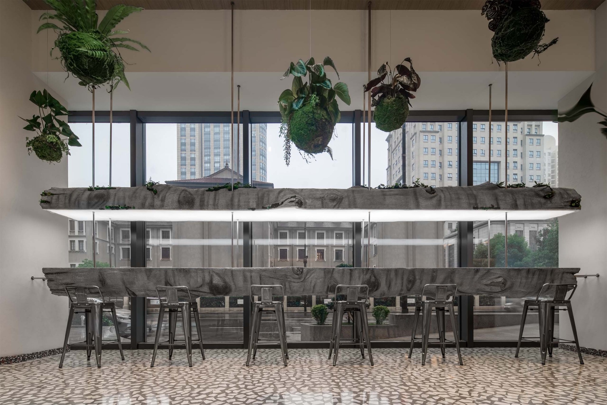 a long table made of tree trunks