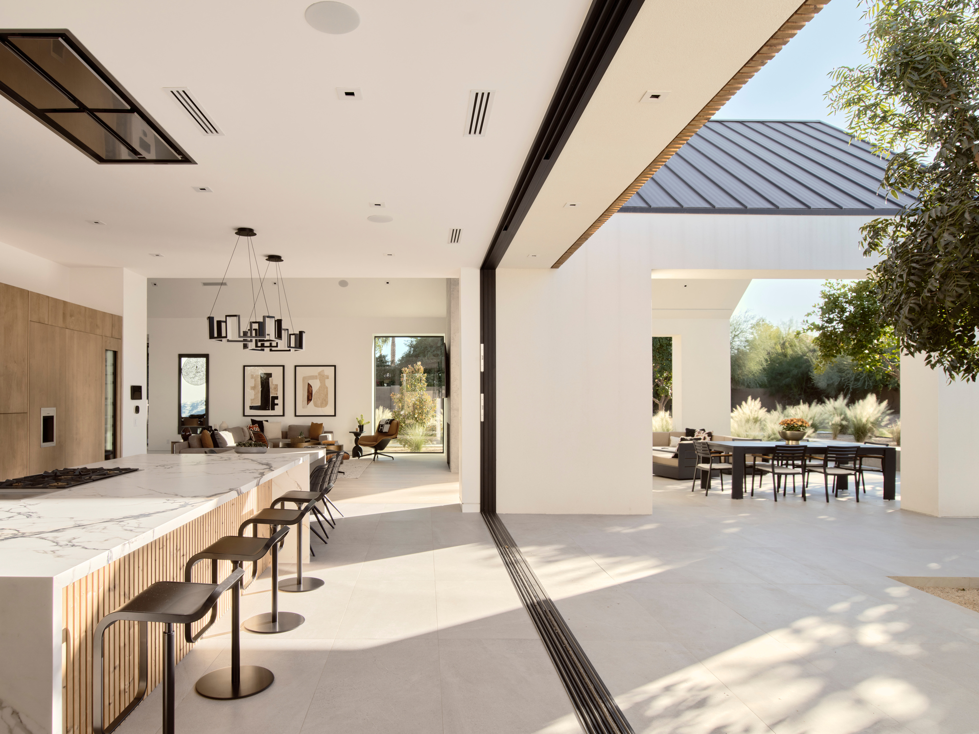 large glass doors leading to an outdoor terrace