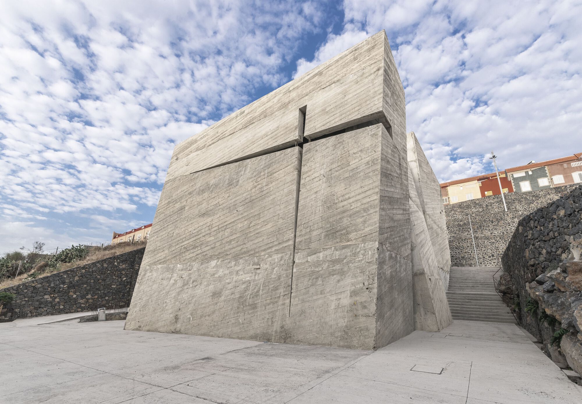 The physical form of The Holy Redeemer Church is a boulder with asymmetrical masses