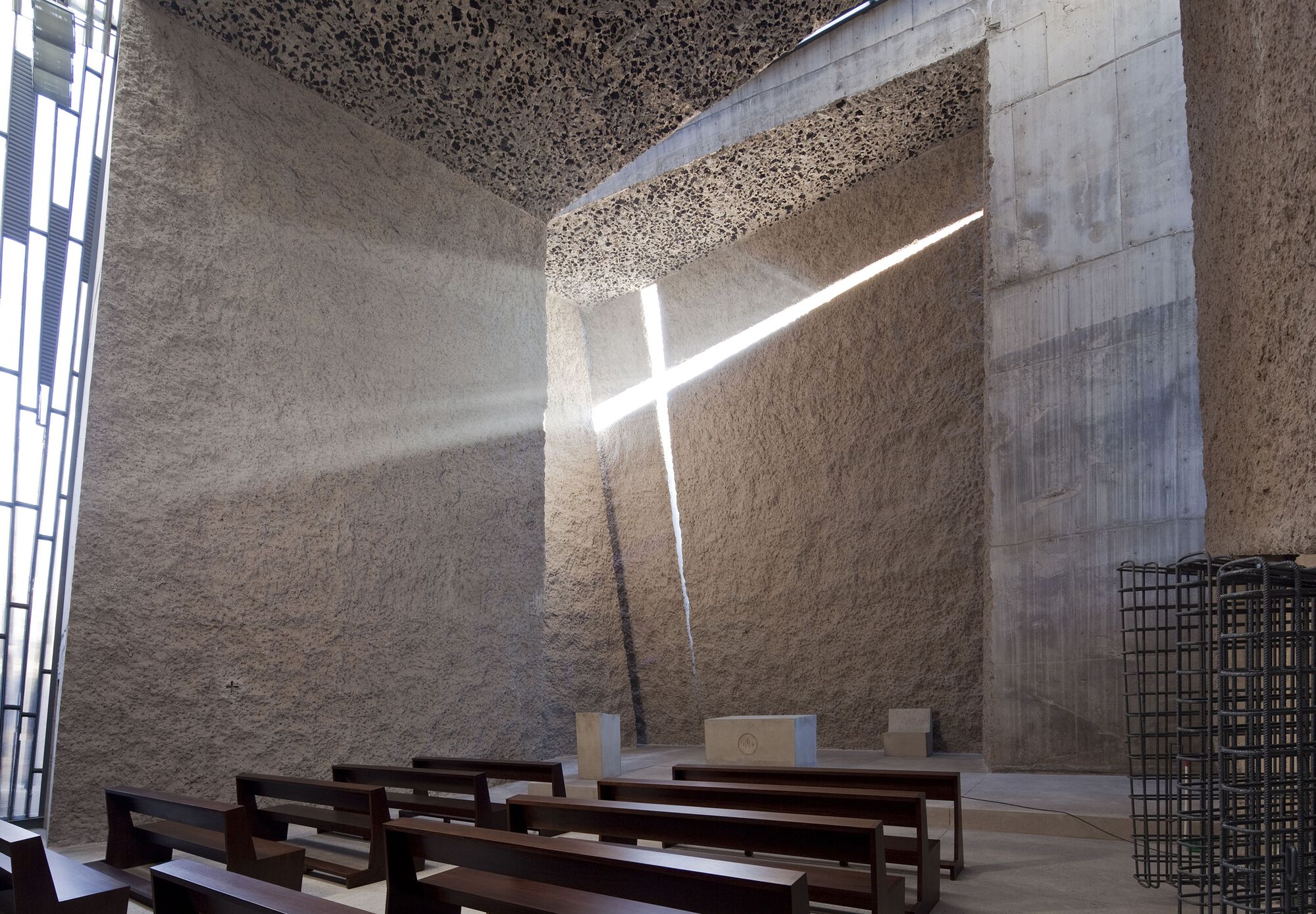 The wall facing the east side has a slit ornament in the shape of a cross