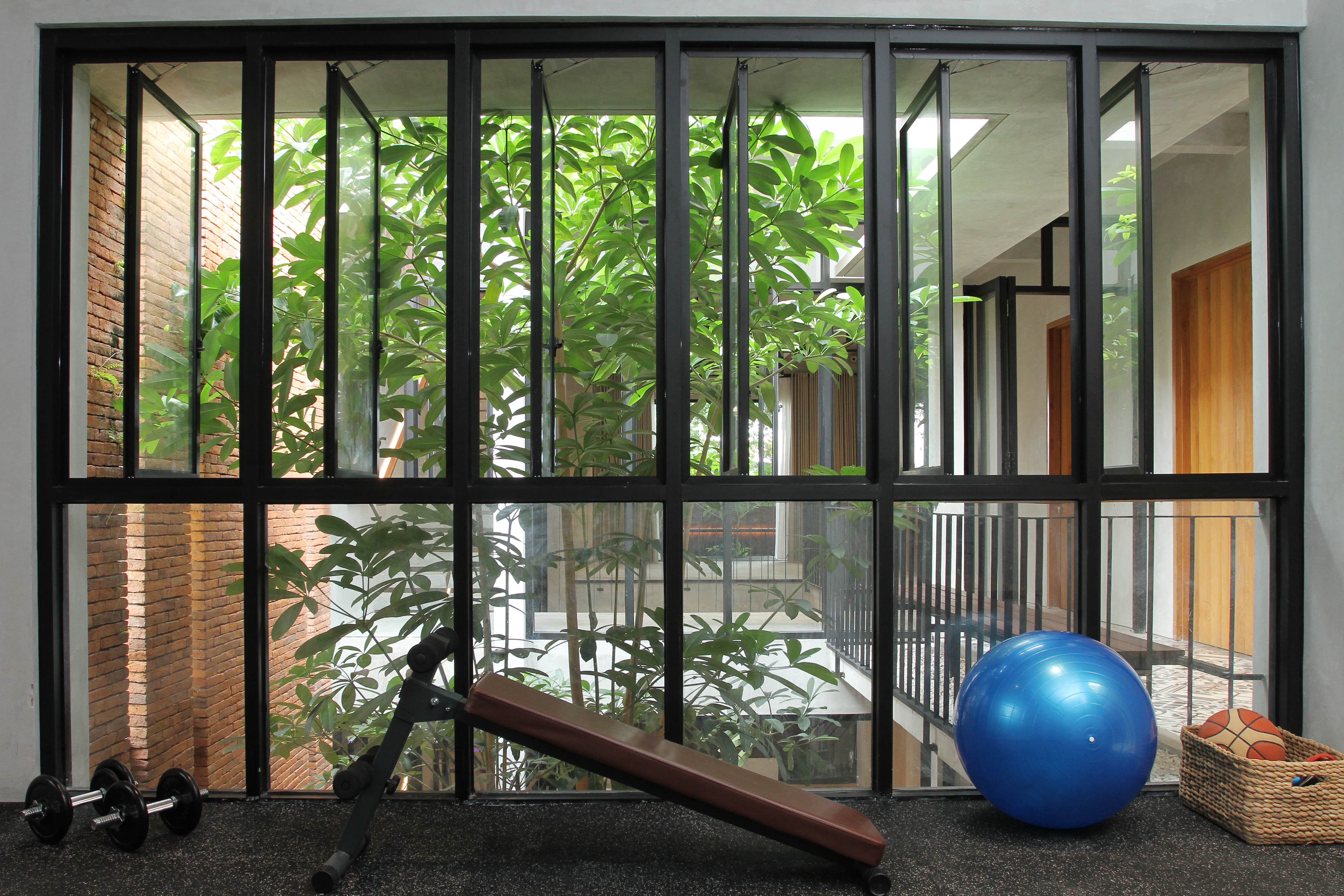 The diversity of residents' activities is one of the considerations in the design of the Y+W House and this gym room is an example