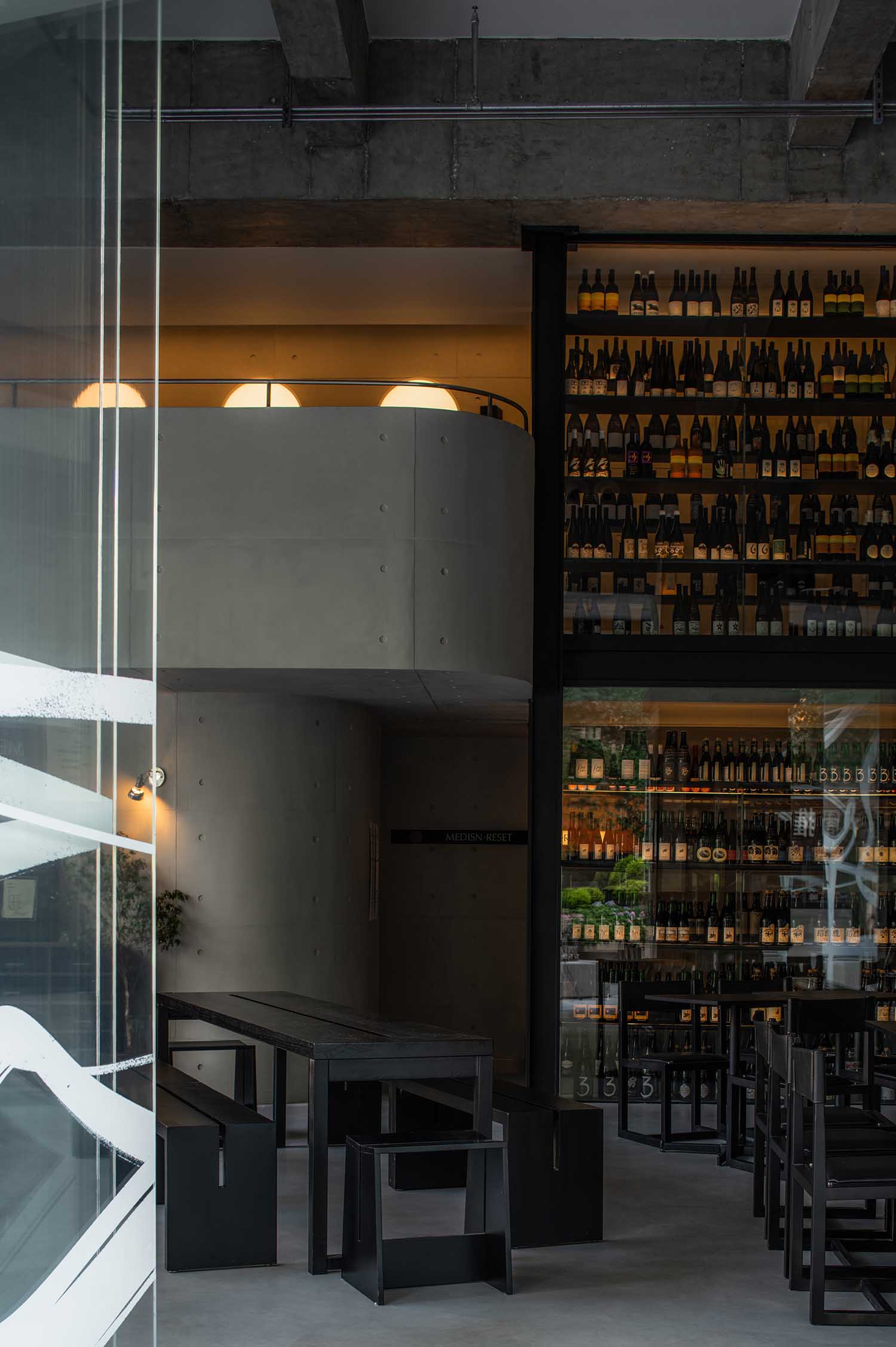 Beside the stairs is a wine cabinet