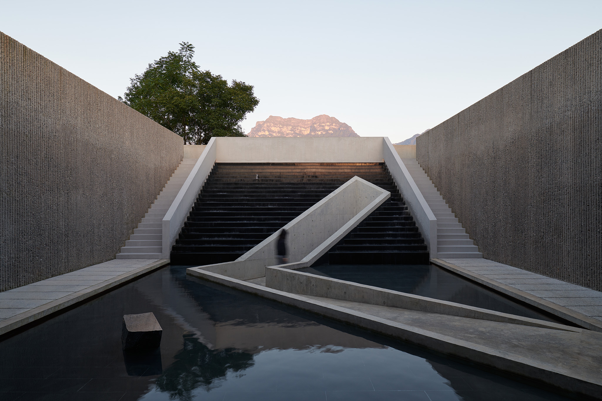 Open courtyard at the core of the building for restaurant and bar, which can frame the peak of Emei