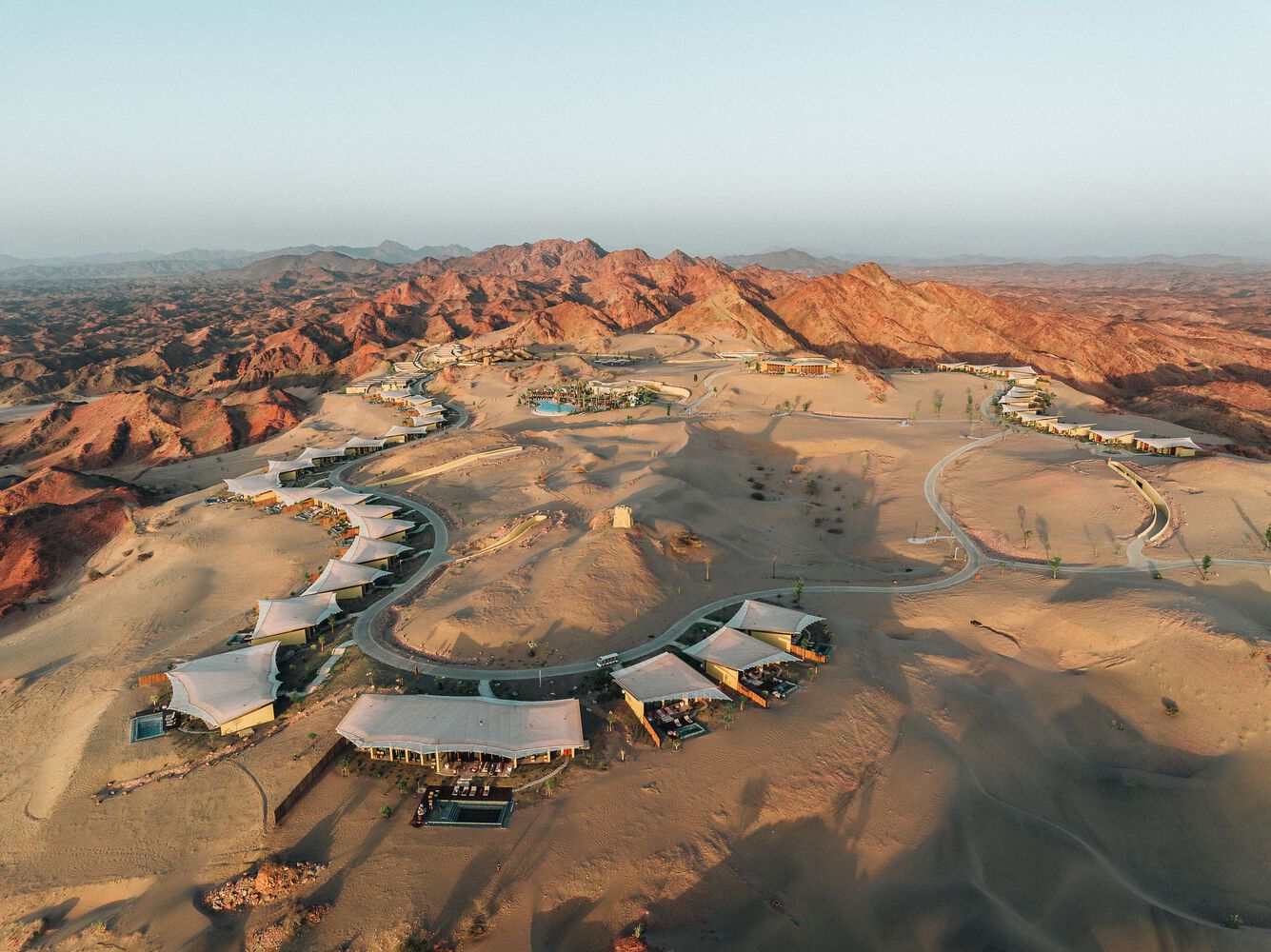 Two rows of villas in Six Senses Southern Dunes Resort