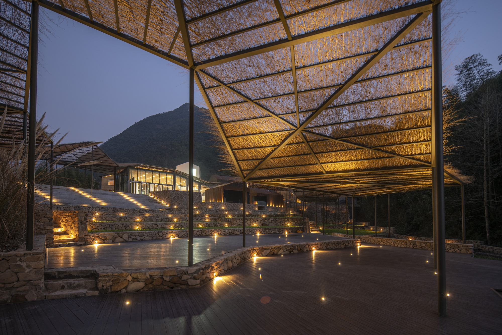 Flowing Cloud Pavilion's canopy supported by metal pillars