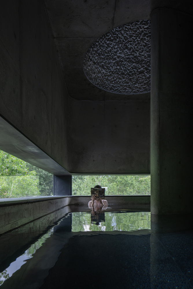 Concrete Building in the Middle of A Forest by Vector Architects