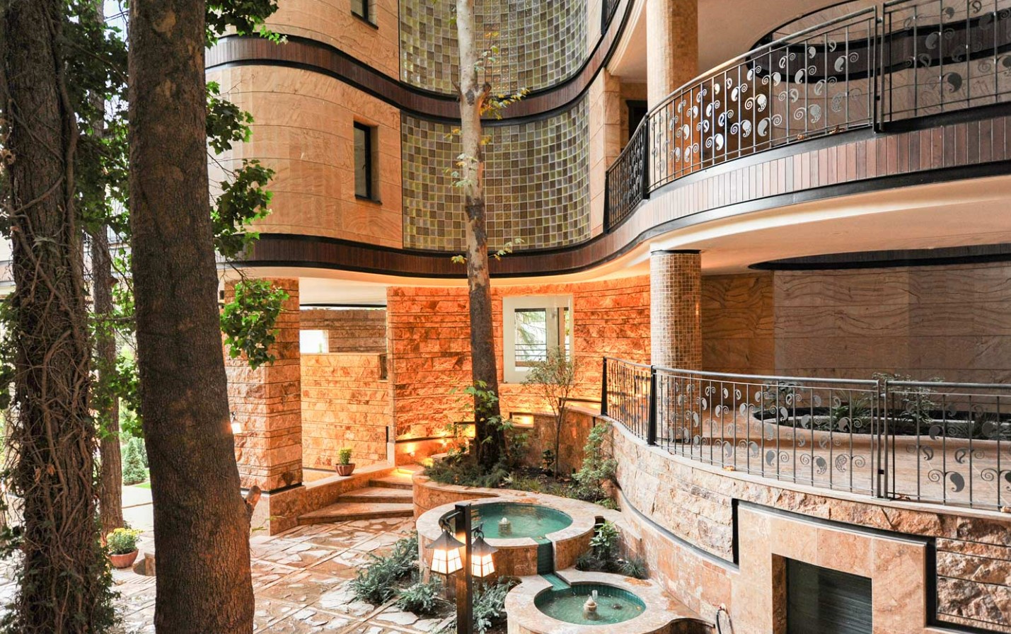 Niavaran Housing Complex: A Curved Building That Protects Old Trees